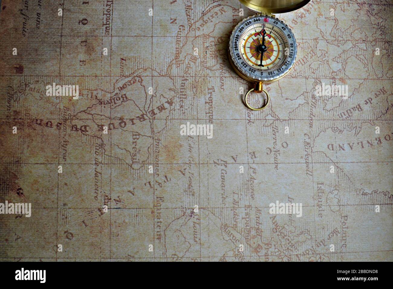 Compass and Chess on old map Stock Photo by ©kwanchaidp 75914687