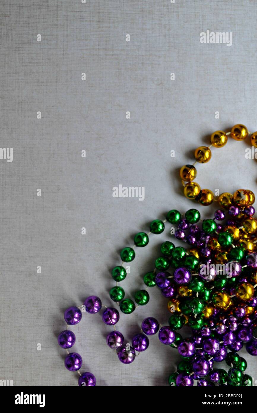 Mardi Gras traditional colorful beads from New Orleans, Luisiana, US Stock Photo