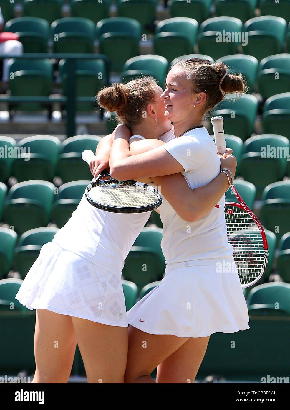 Czech Republic's Barbora Krejcikova and Katerina Siniakova celebrate during  their match against Ukraine's Anhelina Kalinina and Belarus' Iryna  Shymanovich in the Girls' Doubles Final during day thirteen of the  Wimbledon Championships at