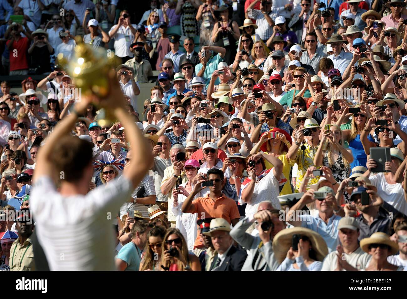 Great Britain's Andy Murray shows the trophy to the crowd after beating Serbia's Novak Djokovic Stock Photo