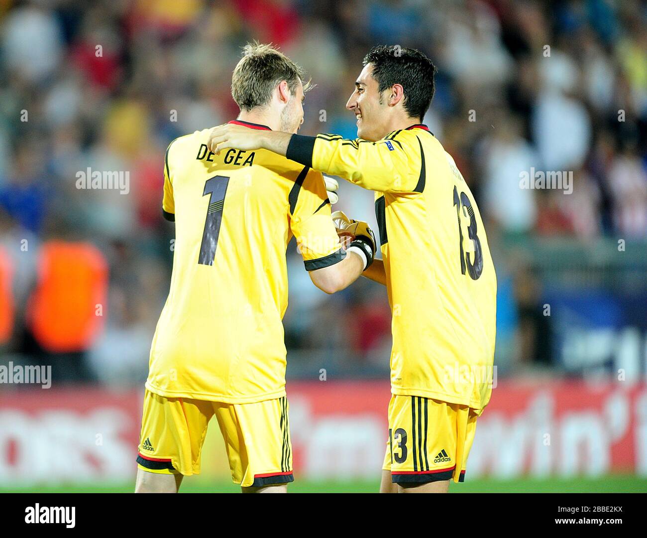 Spain goalkeepers David De Gea (left) and Diego Marino Villar celebrate victory after the final whistle Stock Photo