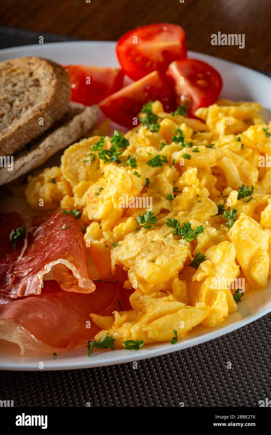 Fresh omelette with ham on plate Stock Photo