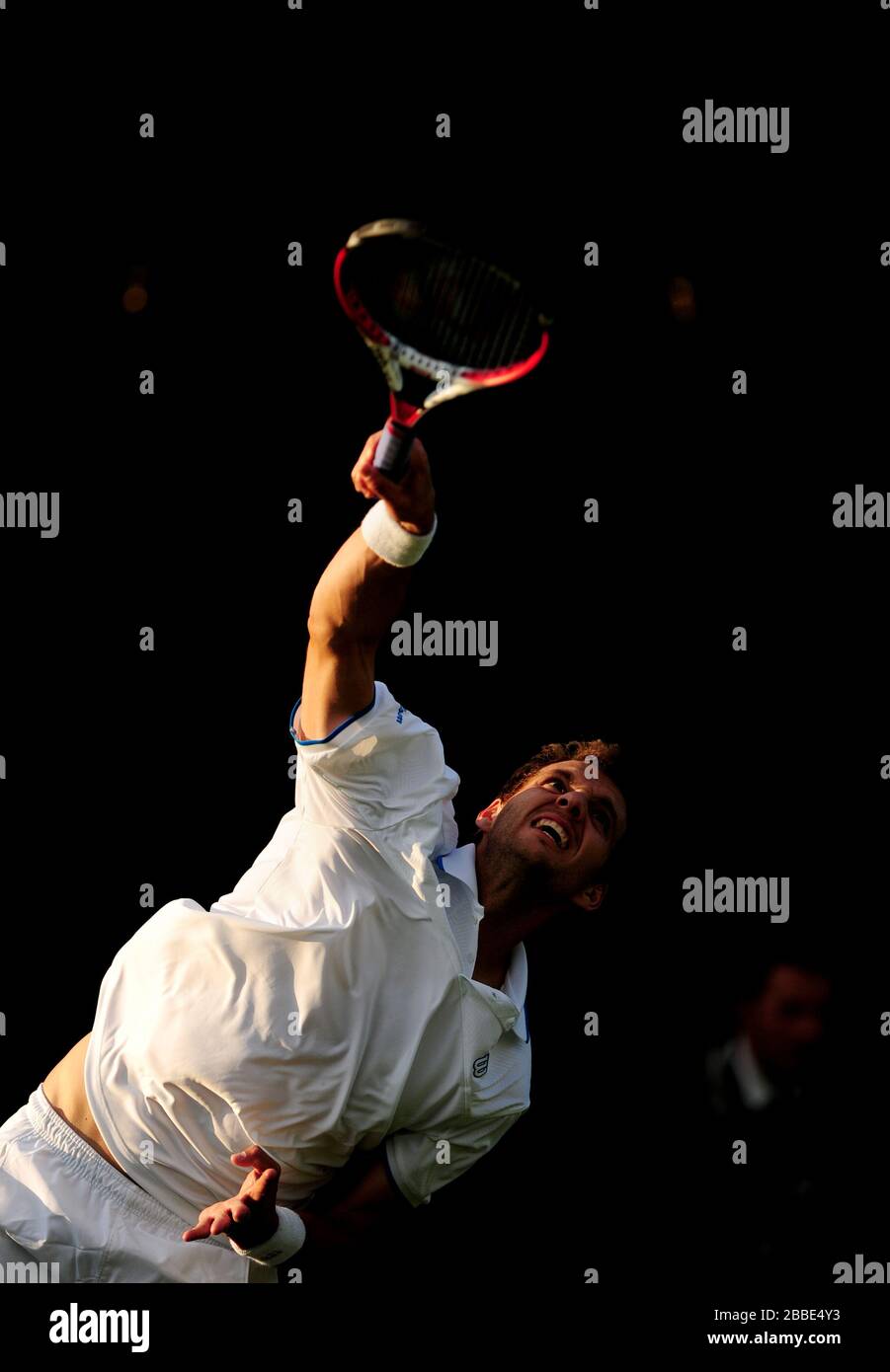 France's Paul-Henri Mathieu in action against Lithuania's Ricardas Berankis Stock Photo