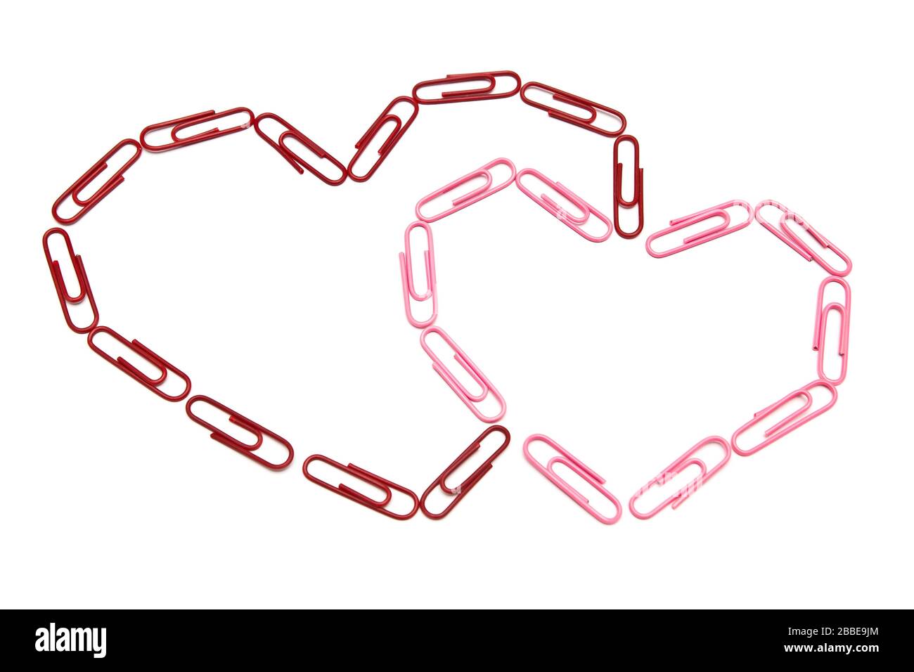 Paper clips hearts on the isolated background Stock Photo Alamy