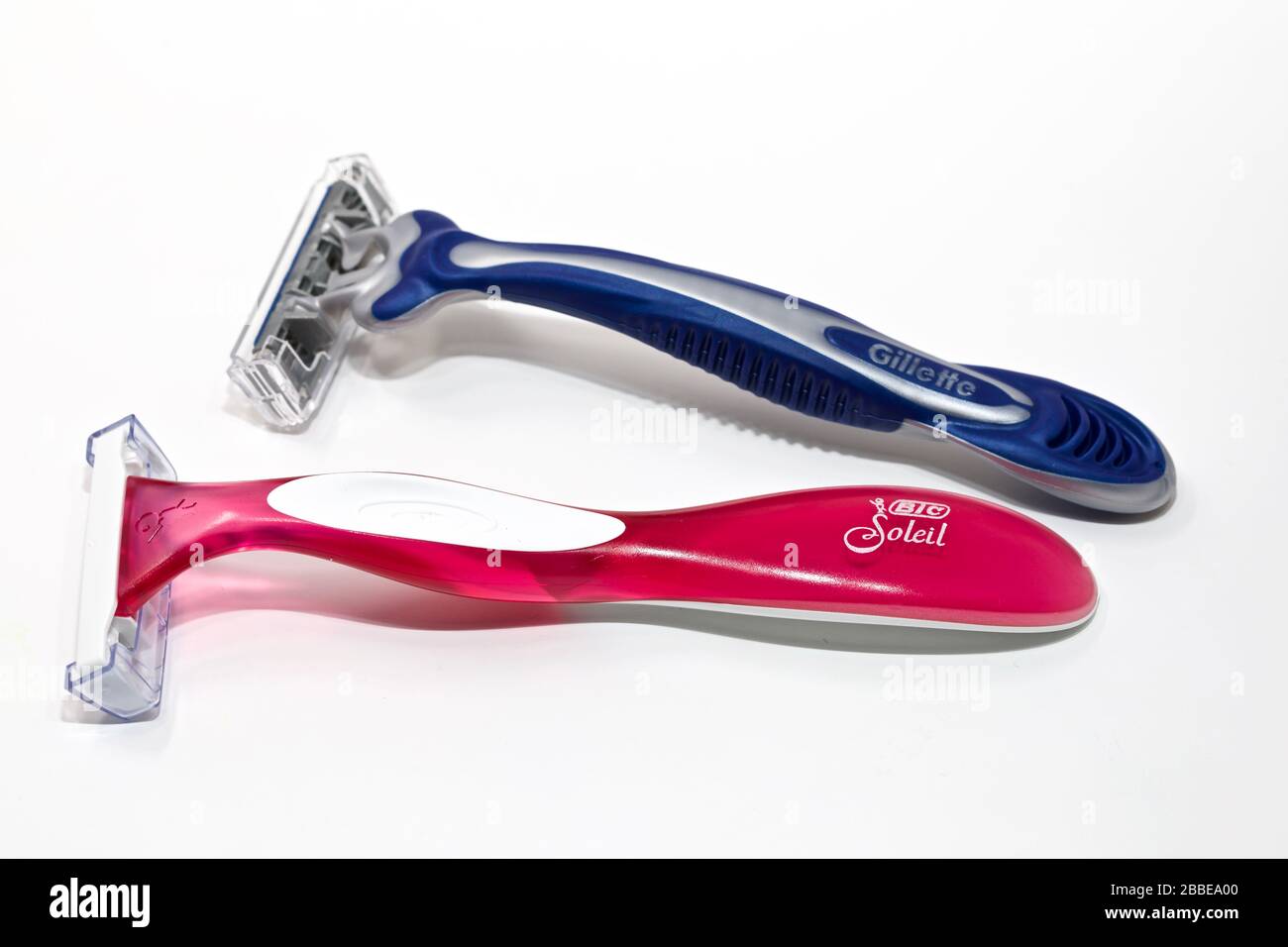 His & Her Disposable Razors on a white background Stock Photo