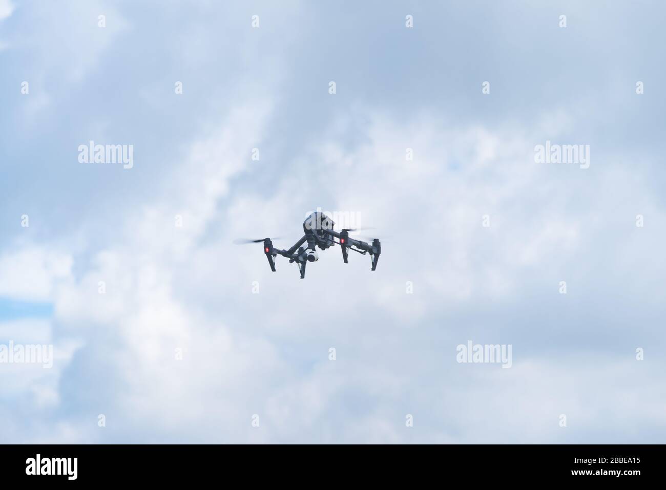 professional drone with camera in the air Stock Photo