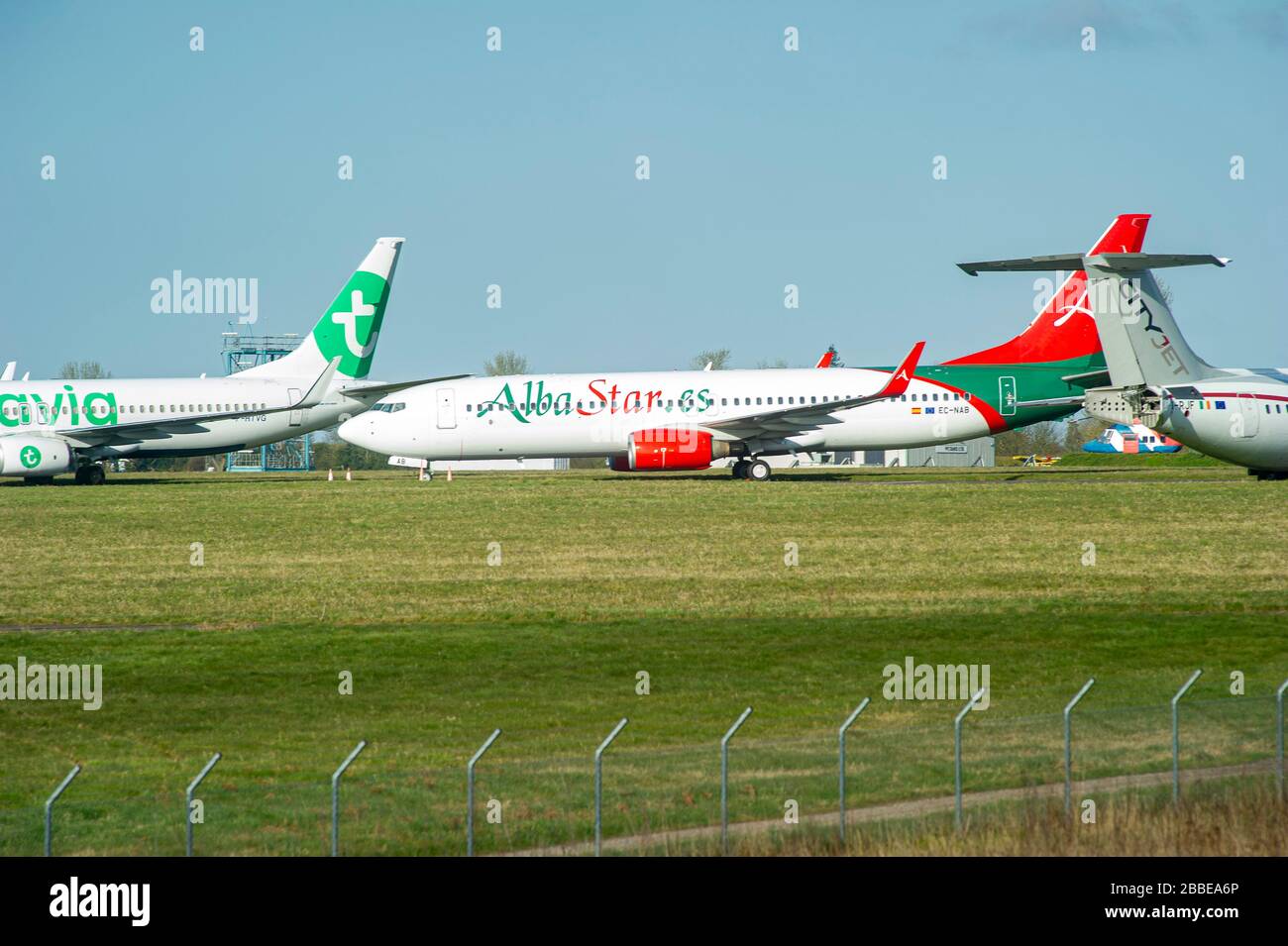 UK Coronavirus. Norwich International Airport, Norfolk, UK, 31st Mar 2020. Aircraft are being stored on the World War Two vintage perimeter tracks at Norwich International Airport to alleviate problems at at other UK airports due to flight cancellations caused by the Coronavirus outbreak.  Credit Jason Bye/Alamy Live News Stock Photo