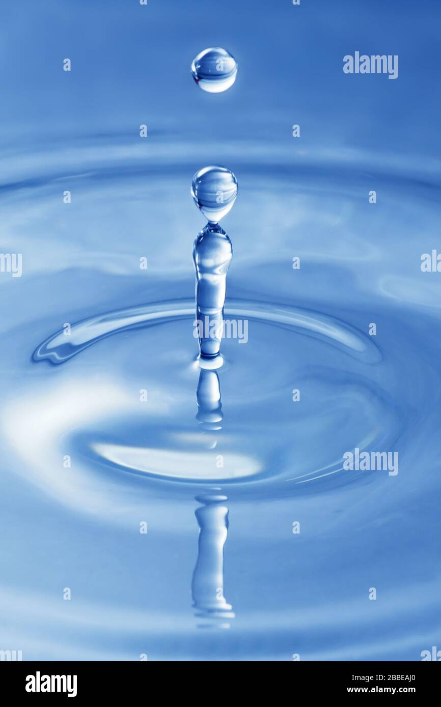 Small Drop Blue water drop - small splash Stock Photo - Alamy