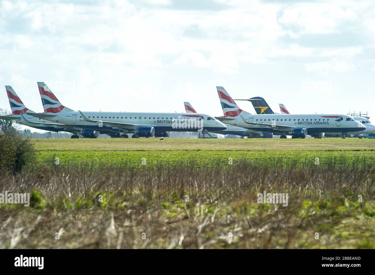 UK Coronavirus. Norwich International Airport, Norfolk, UK, 31st Mar 2020. Aircraft are being stored on the World War Two vintage perimeter tracks at Norwich International Airport to alleviate problems at at other UK airports due to flight cancellations caused by the Coronavirus outbreak.  Credit Jason Bye/Alamy Live News Stock Photo