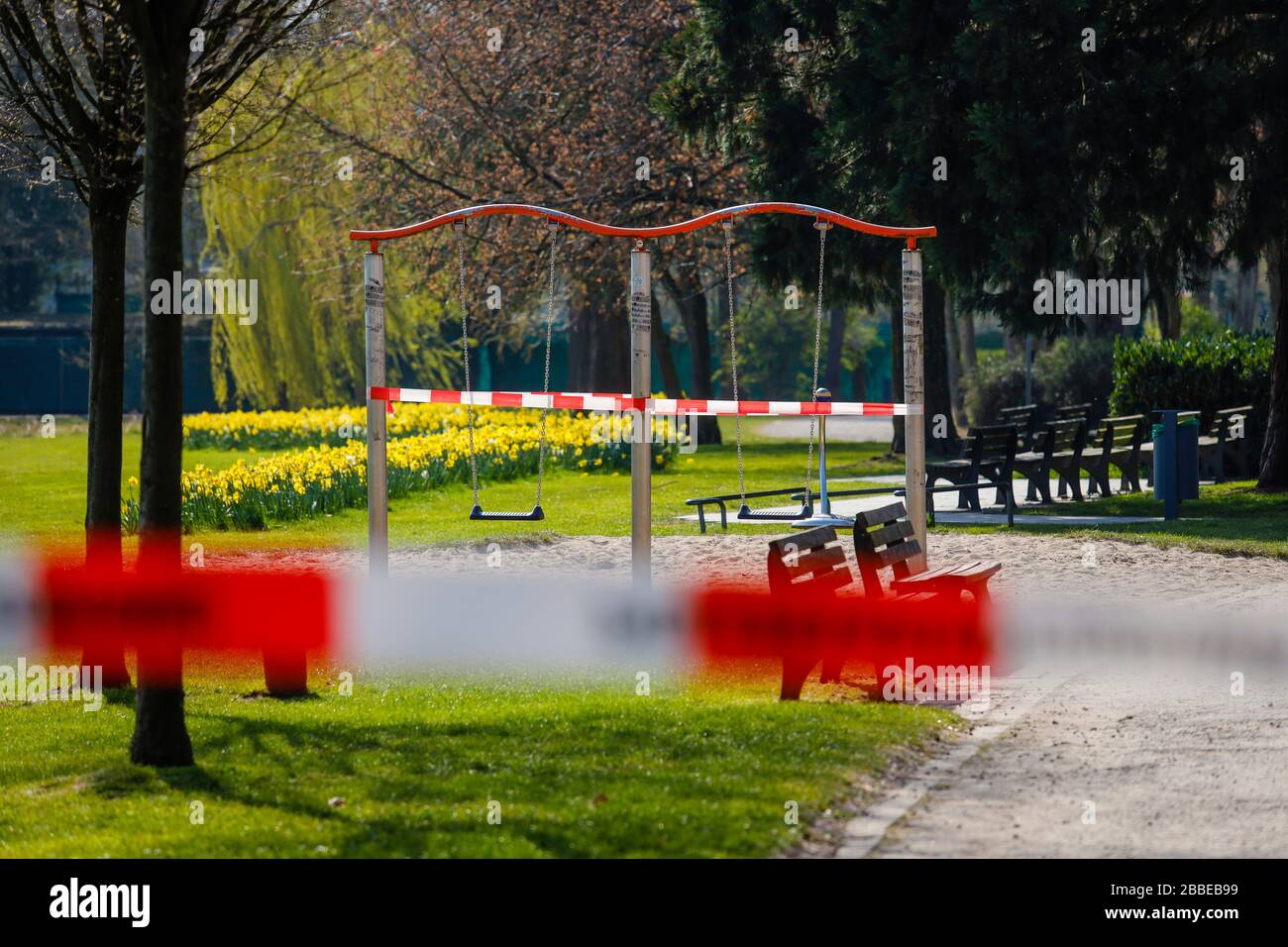 Essen, Ruhr Area, North Rhine-Westphalia, Germany - Contact ban due to Corona Pandemic, the park at Haumannplatz was closed because too many citizens Stock Photo