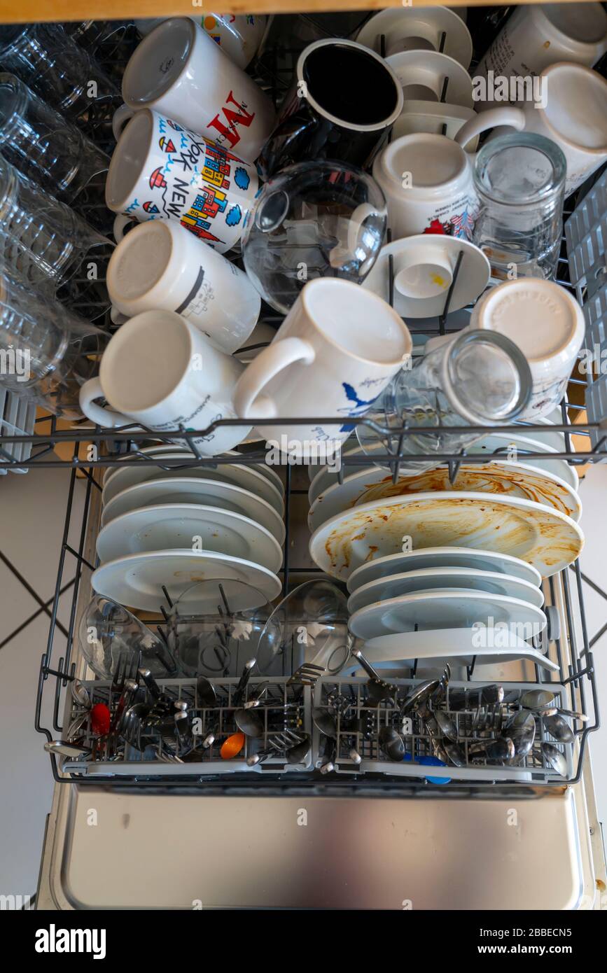 Dishwasher, full of dirty dishes Stock Photo Alamy