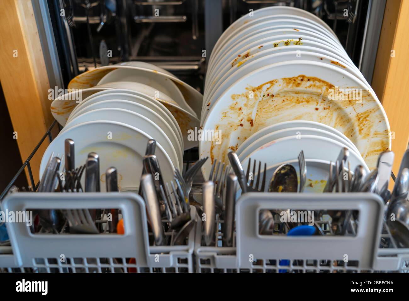 Dishwasher, full of dirty dishes Stock Photo Alamy