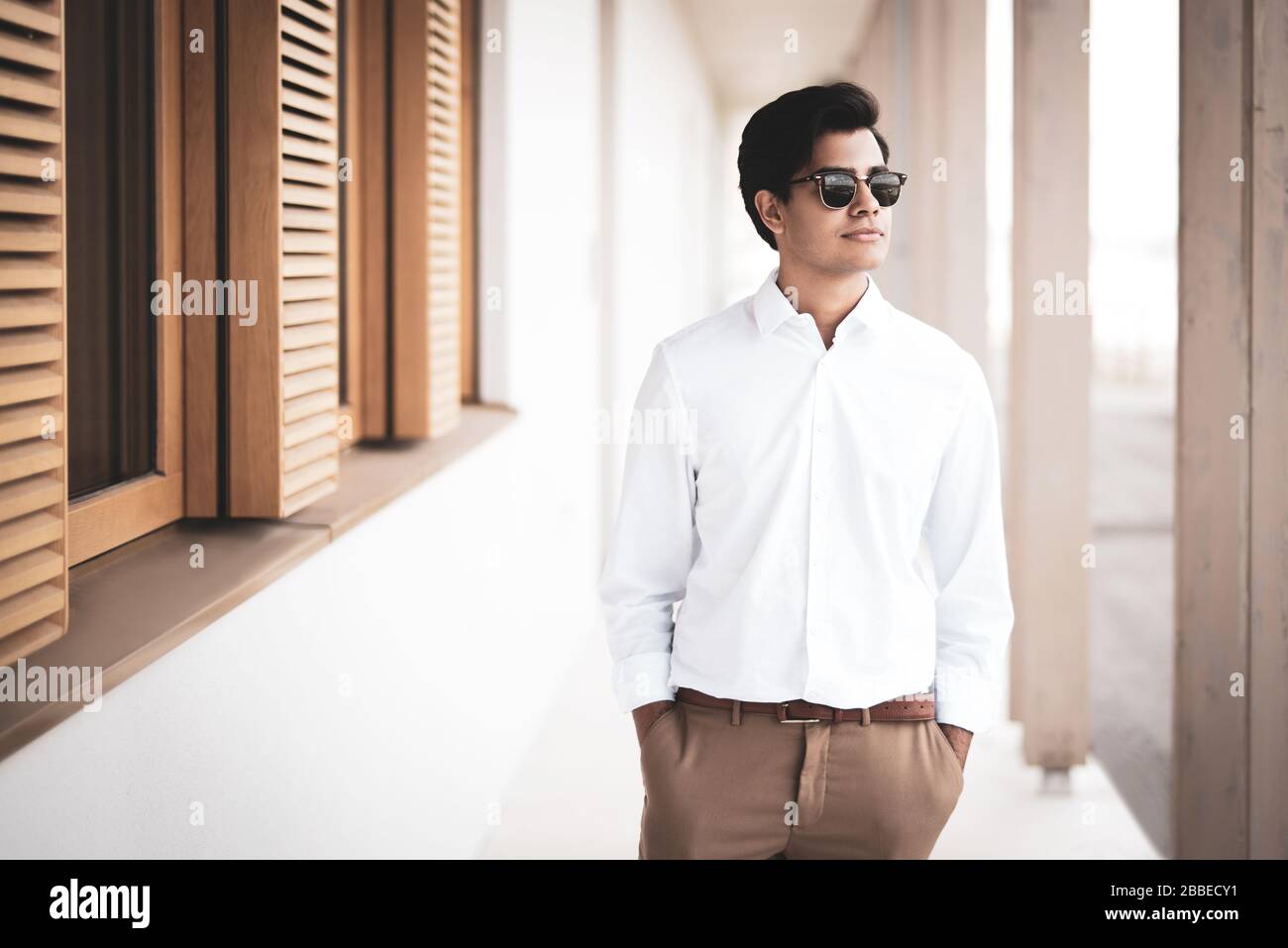 Cool young man posing for the camera Stock Photo