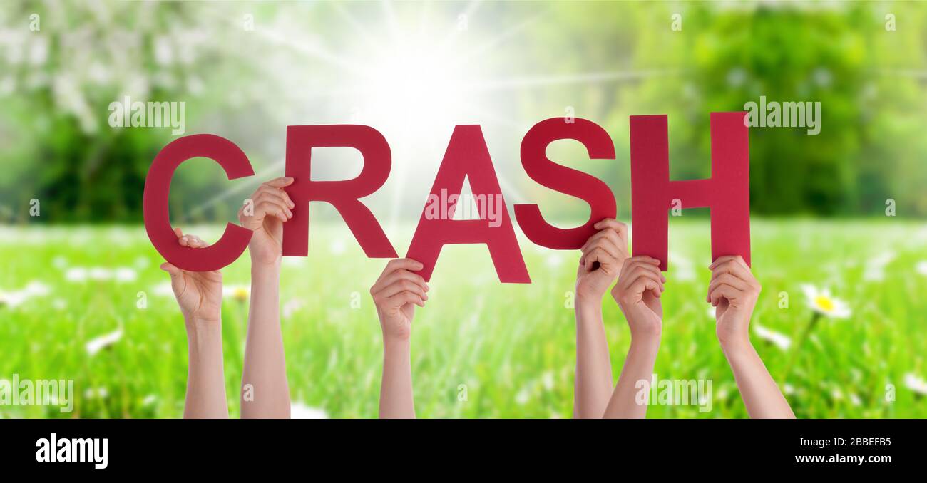 People Hands Holding Word Crash, Grass Meadow Stock Photo