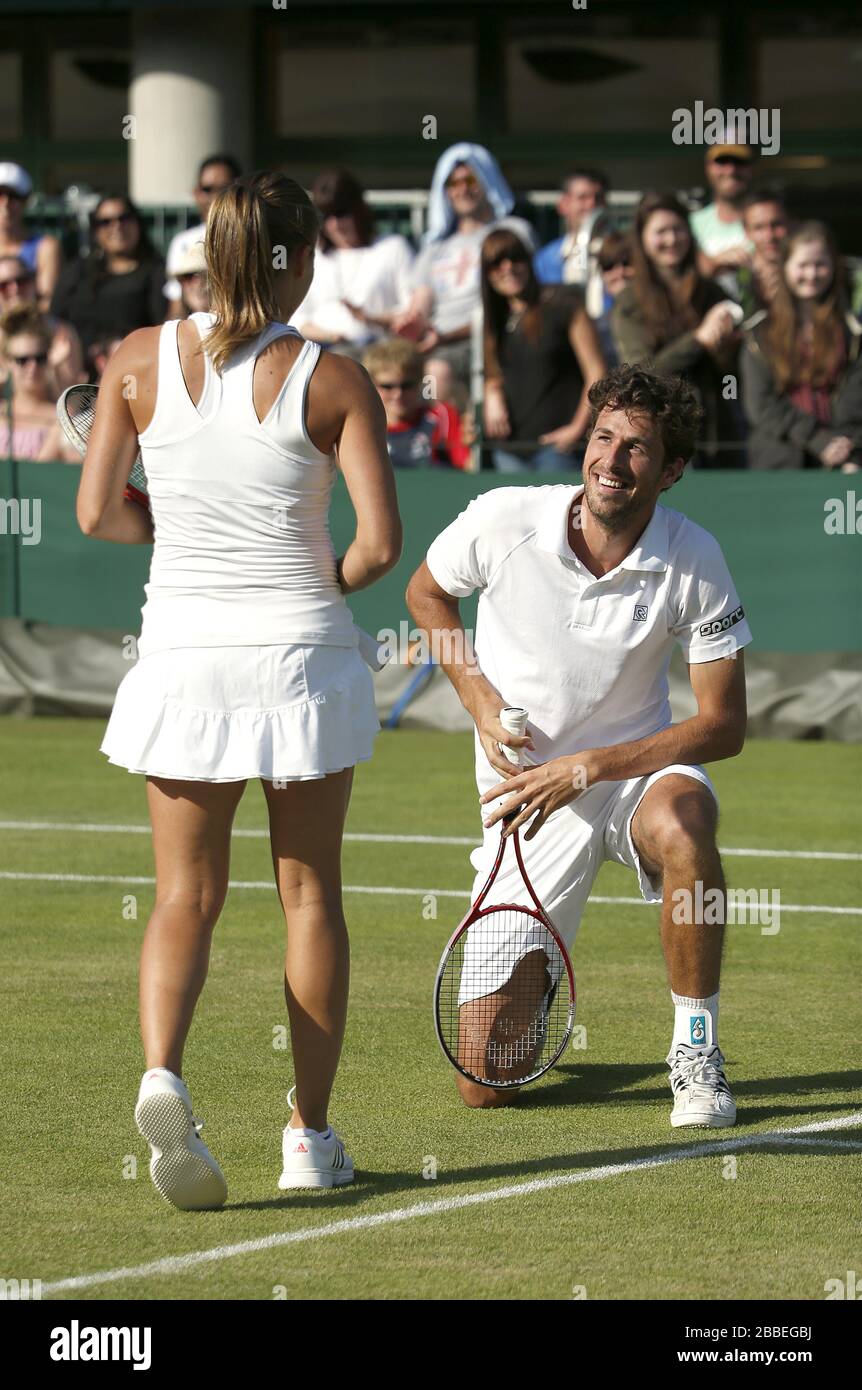 The Netherlands' Robin Haase and Poland's Alicja Rosolska react in their  mixed doubles match against Great Britain's Jonathan Marray and Heather  Watson during day six of the Wimbledon Championships at The All