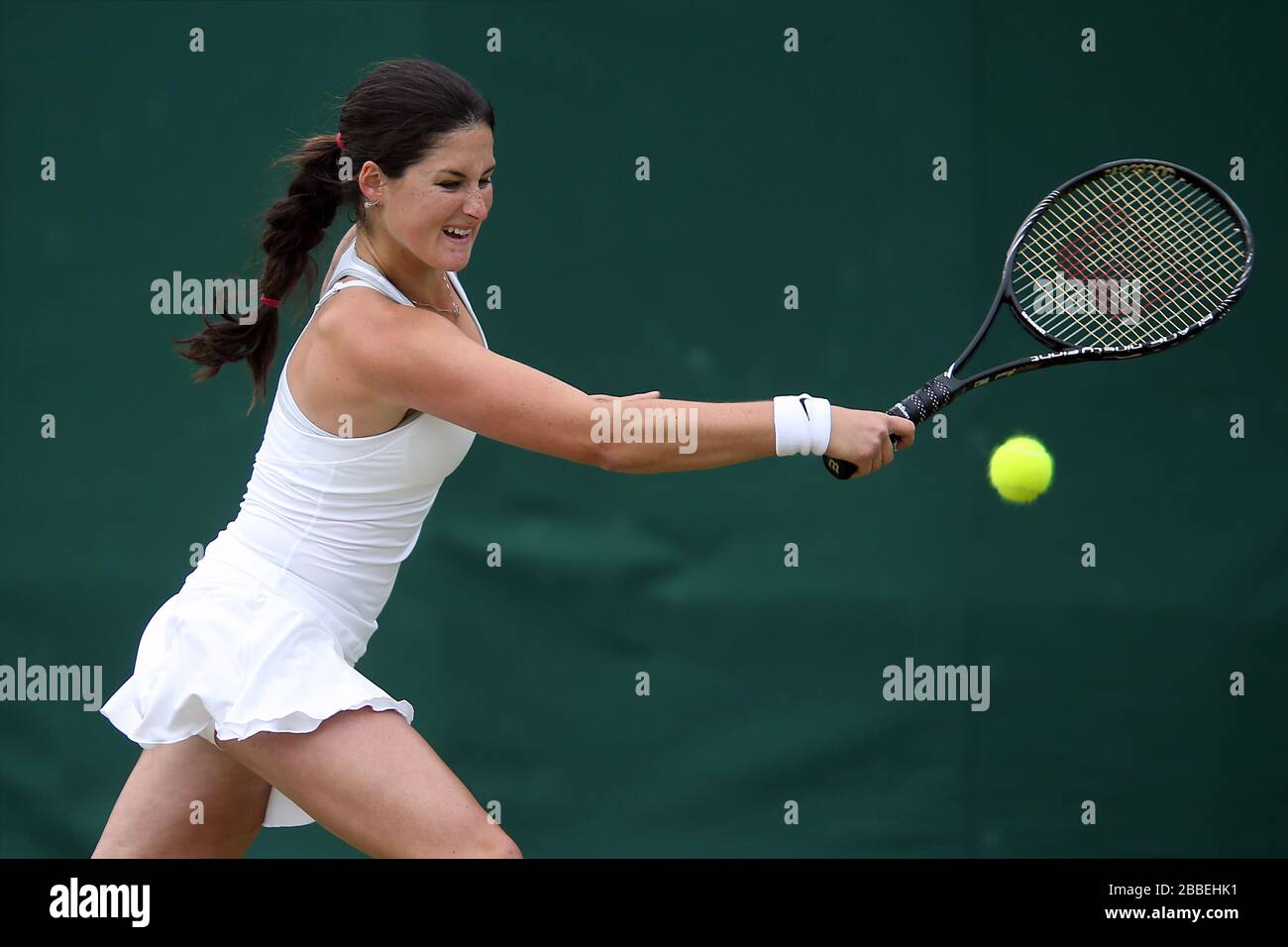 USA's Jamie Loeb in action against Paraguay's Camila Giangreco Campiz during day eight of Wimbledon held at The All England Lawn Tennis and Croquet Club Stock Photo