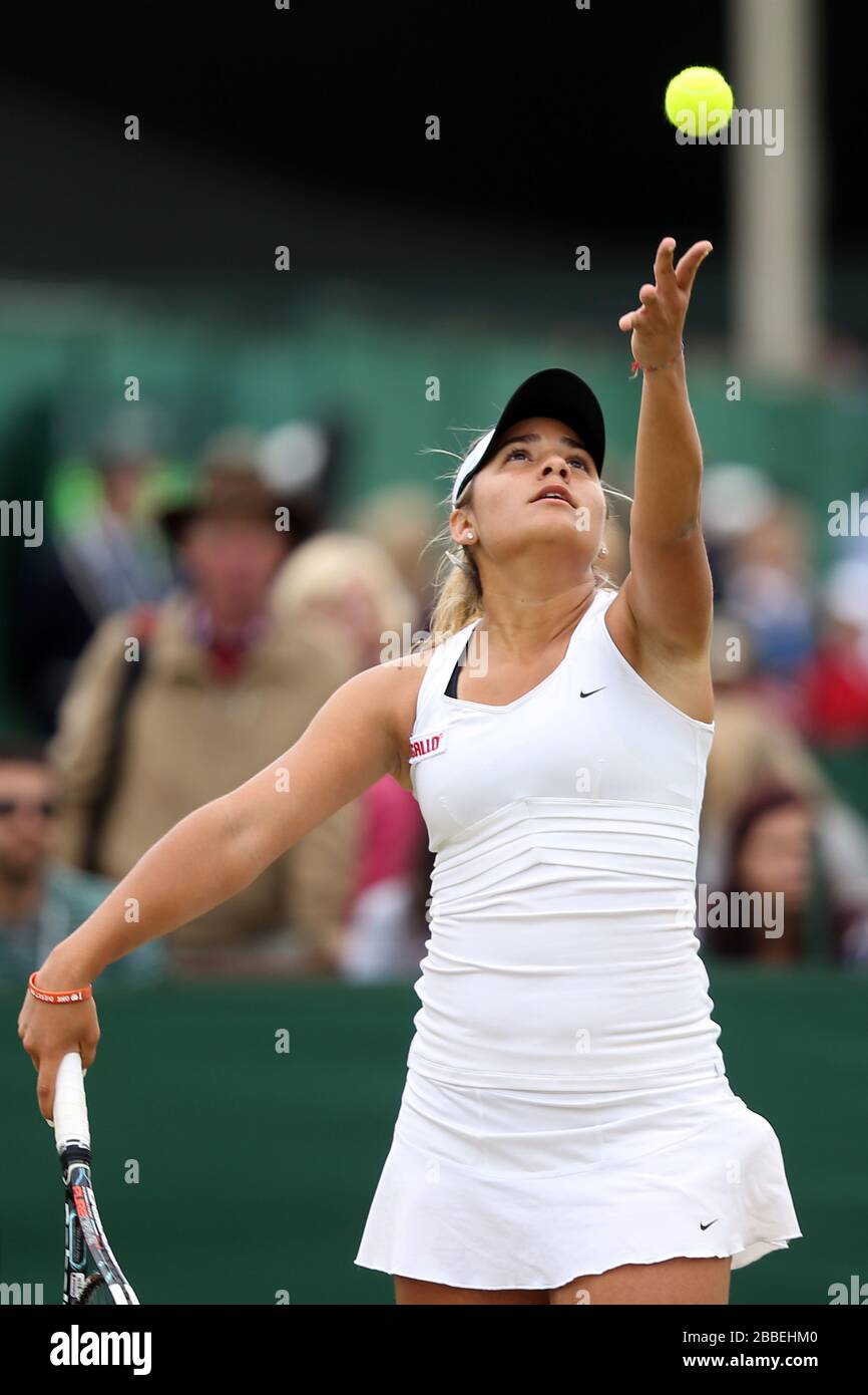 Paraguay's Camila Giangreco Campiz in action against USA's Jamie Loeb during day eight of Wimbledon held at The All England Lawn Tennis and Croquet Club Stock Photo