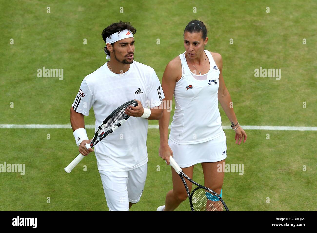 Italy's Fabio Fognini and Flavia Pennetta during mixed doubles action  against Great Britain's Jamie Delgado and Tara Moore during day six of the  Wimbledon Championships at The All England Lawn Tennis and