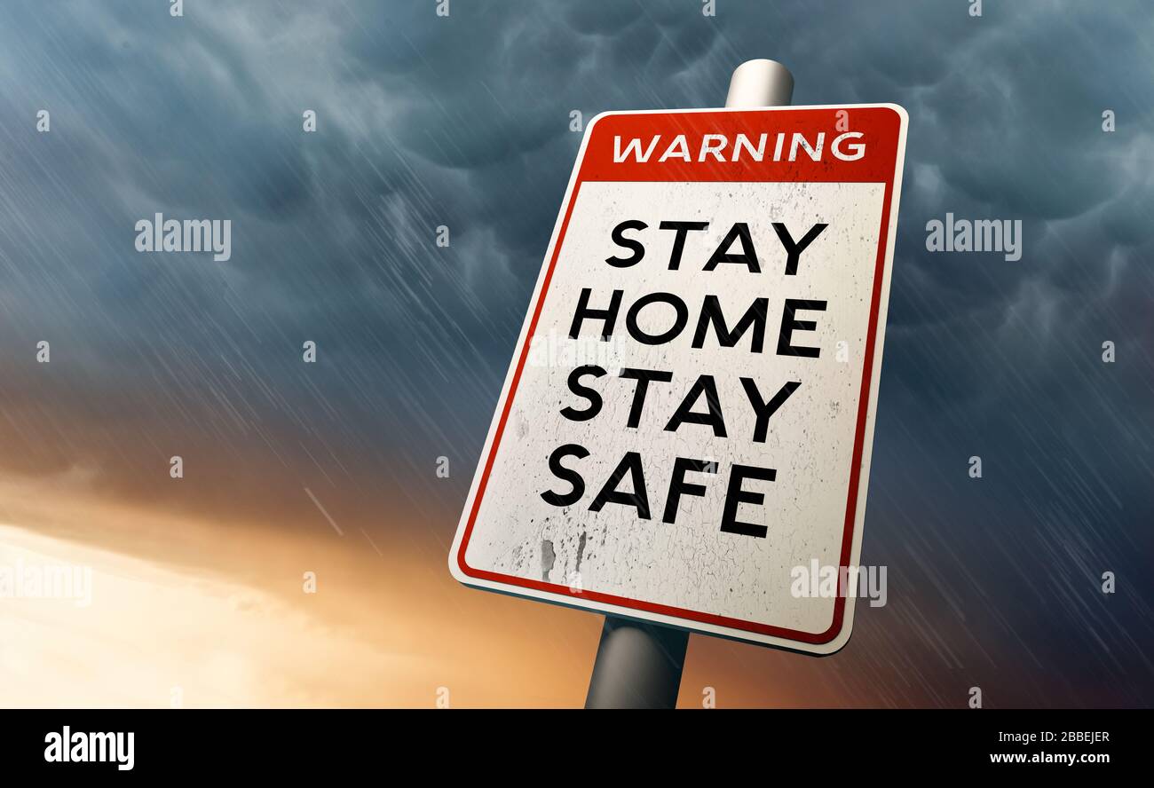 Stay Home And Stay Safe Warning Sign With A Storm In The Background stay-home-and-stay-safe-warning-sign-with-a-storm-in-the-background