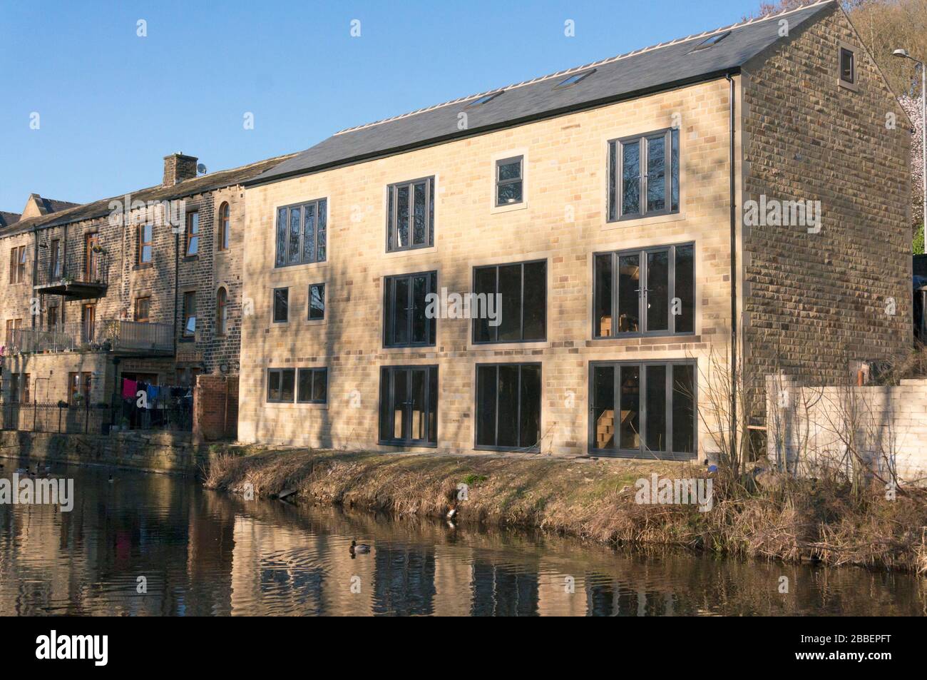 Modern house designed to be in keeping with its Victorian surroundings, Luddenden Foot, West Yorkshire Stock Photo