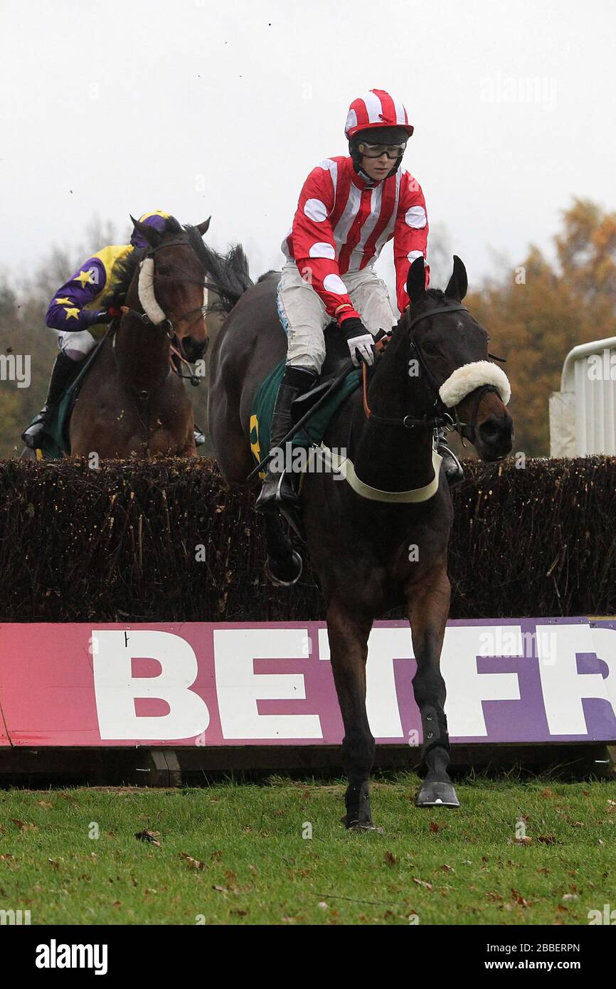 Benny The Swinger ridden by Brendan Powell leads during the Fakenham, Diana And Tonys Favourite Racecourse Conditional Jockeys Handicap Chase but take Stock Photo