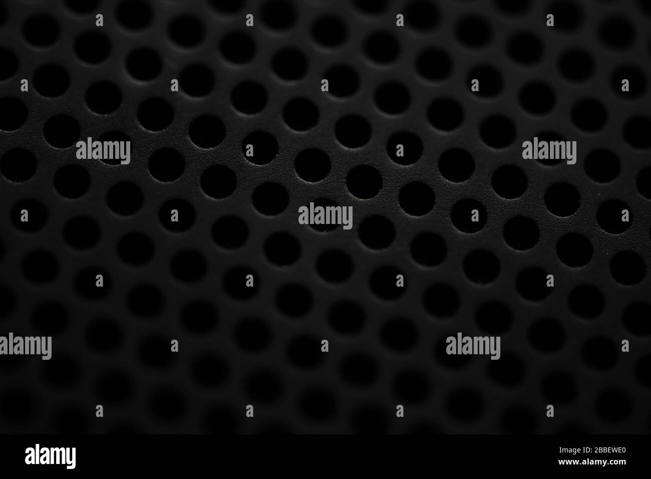 A set of numbers (1234567890), silver metal perforated with small holes  isolated on white background close-up Stock Photo - Alamy