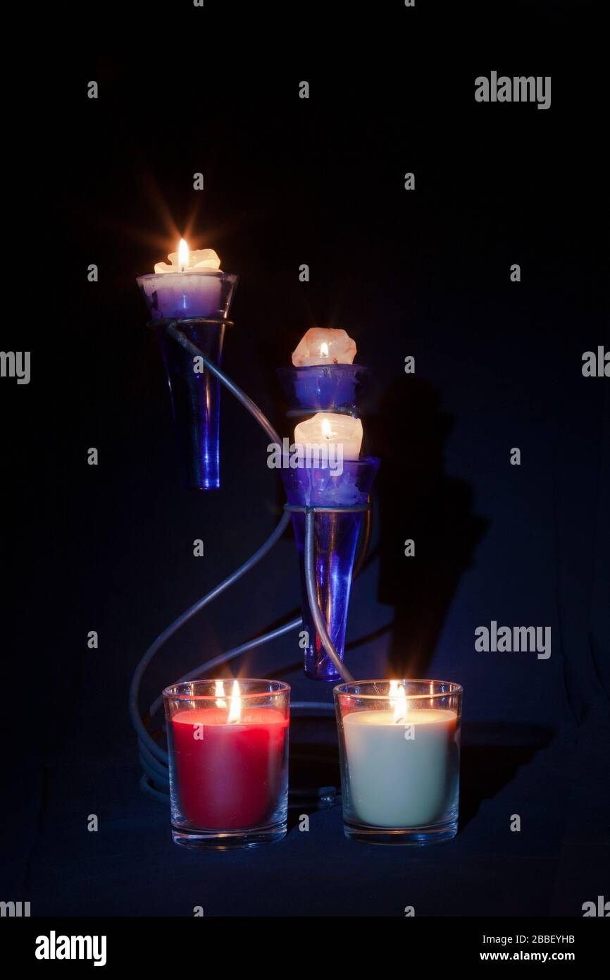 Lite Candles against a black background taken using candle light and a
