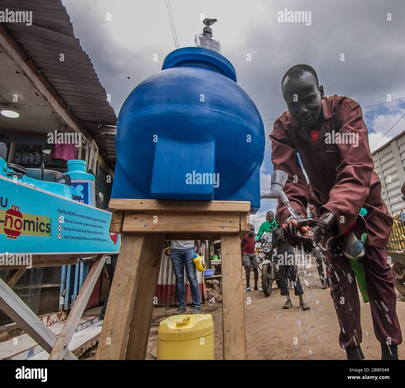 Nairobi, Kenya. 20th Mar, 2020. A man washing his hands at a local
