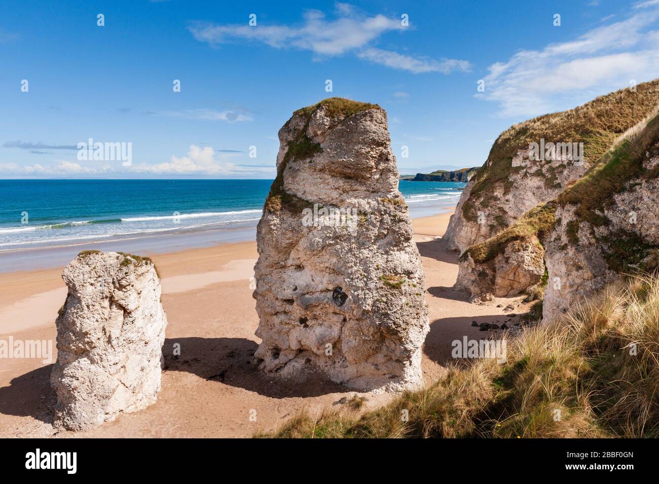 Limestone cliffs and sea stacks at the Whiterocks beach near Portrush on the north Antrim Causeway coast of Northern Ireland Stock Photo