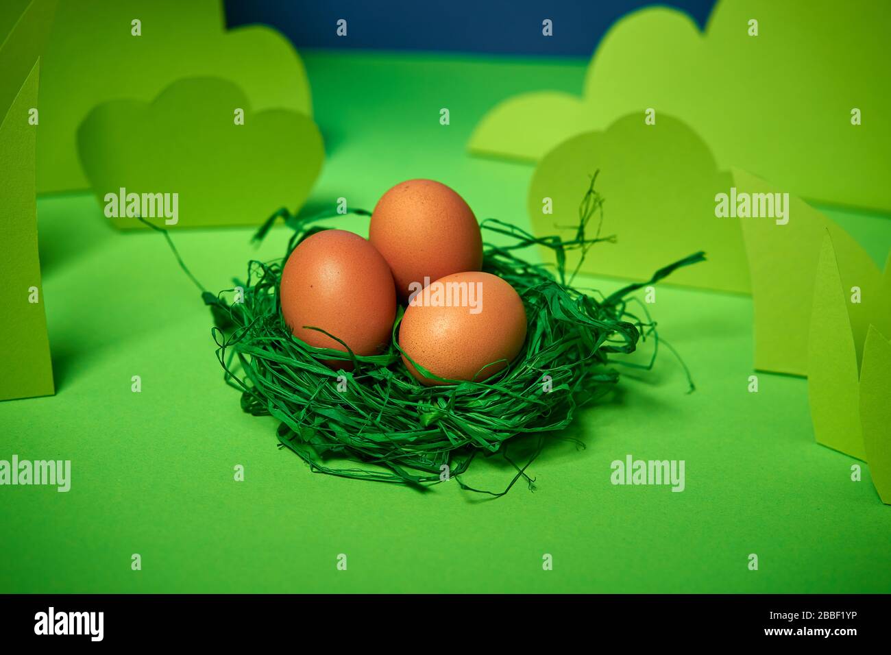 beautiful green spring background with easter eggs Stock Photo