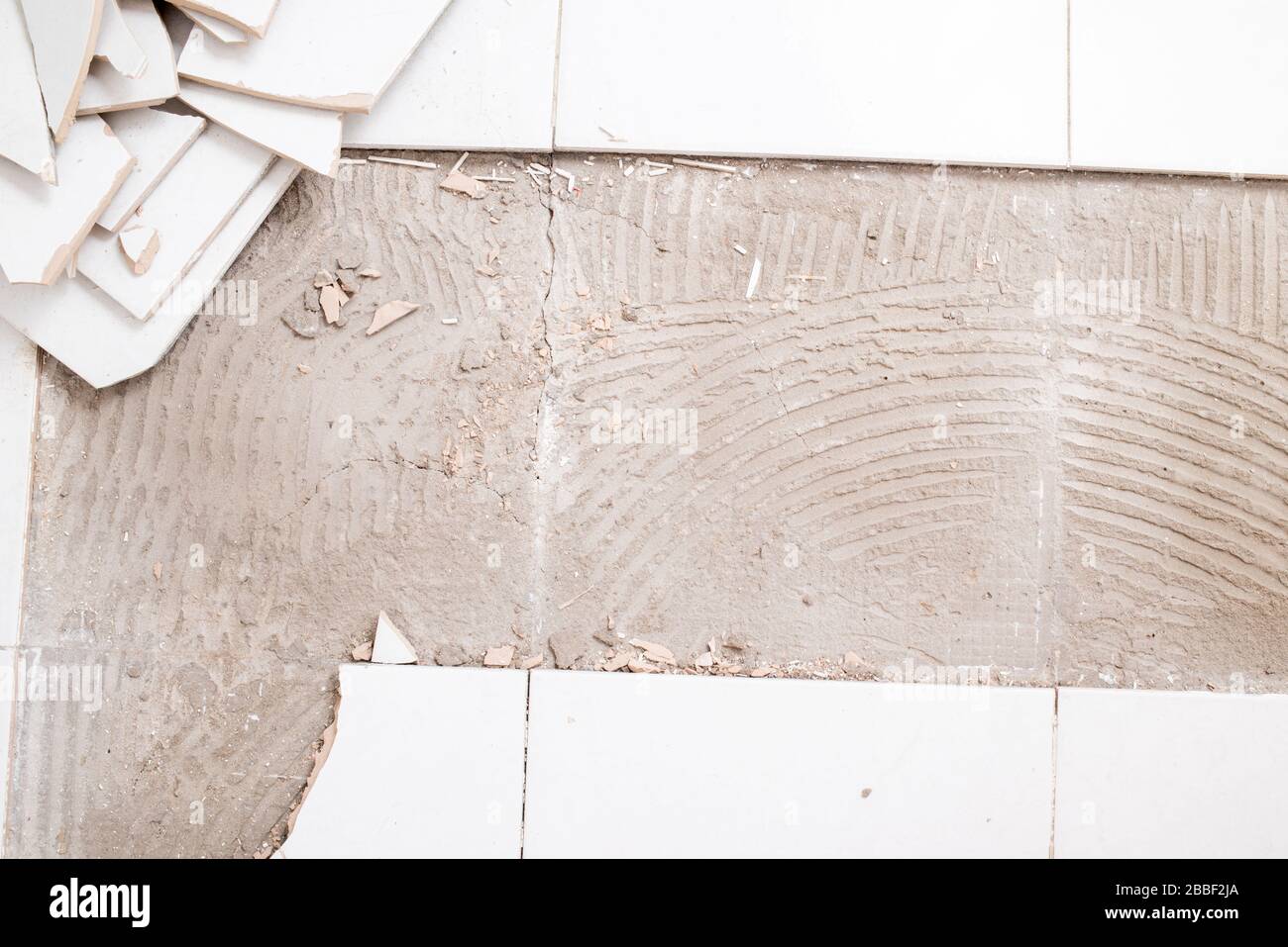 Broken white ceramic floor Stock Photo