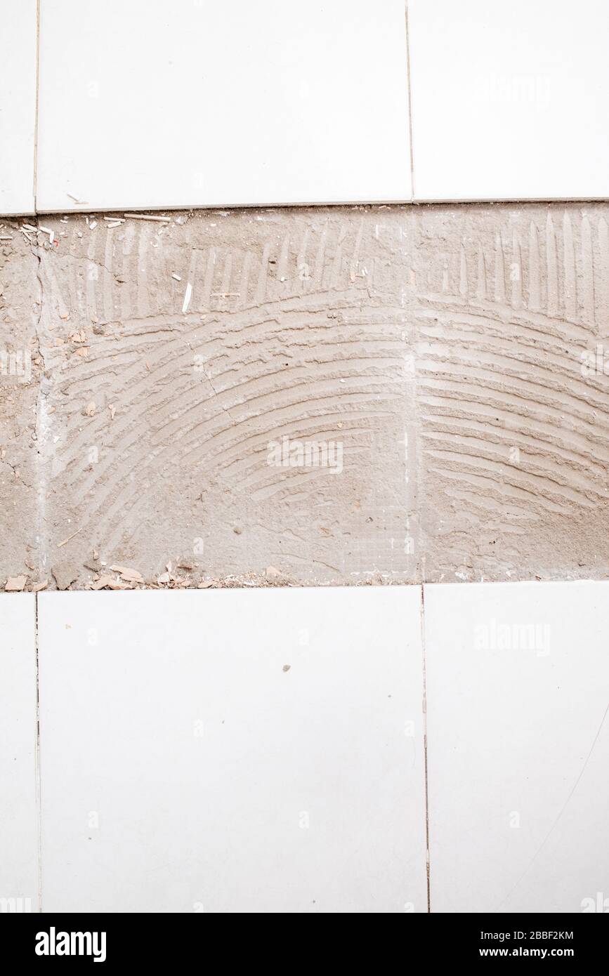 Broken white ceramic floor Stock Photo