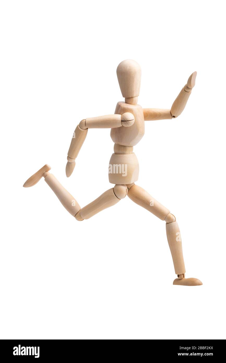 Wooden figure running isolated on white background with clipping paths ...