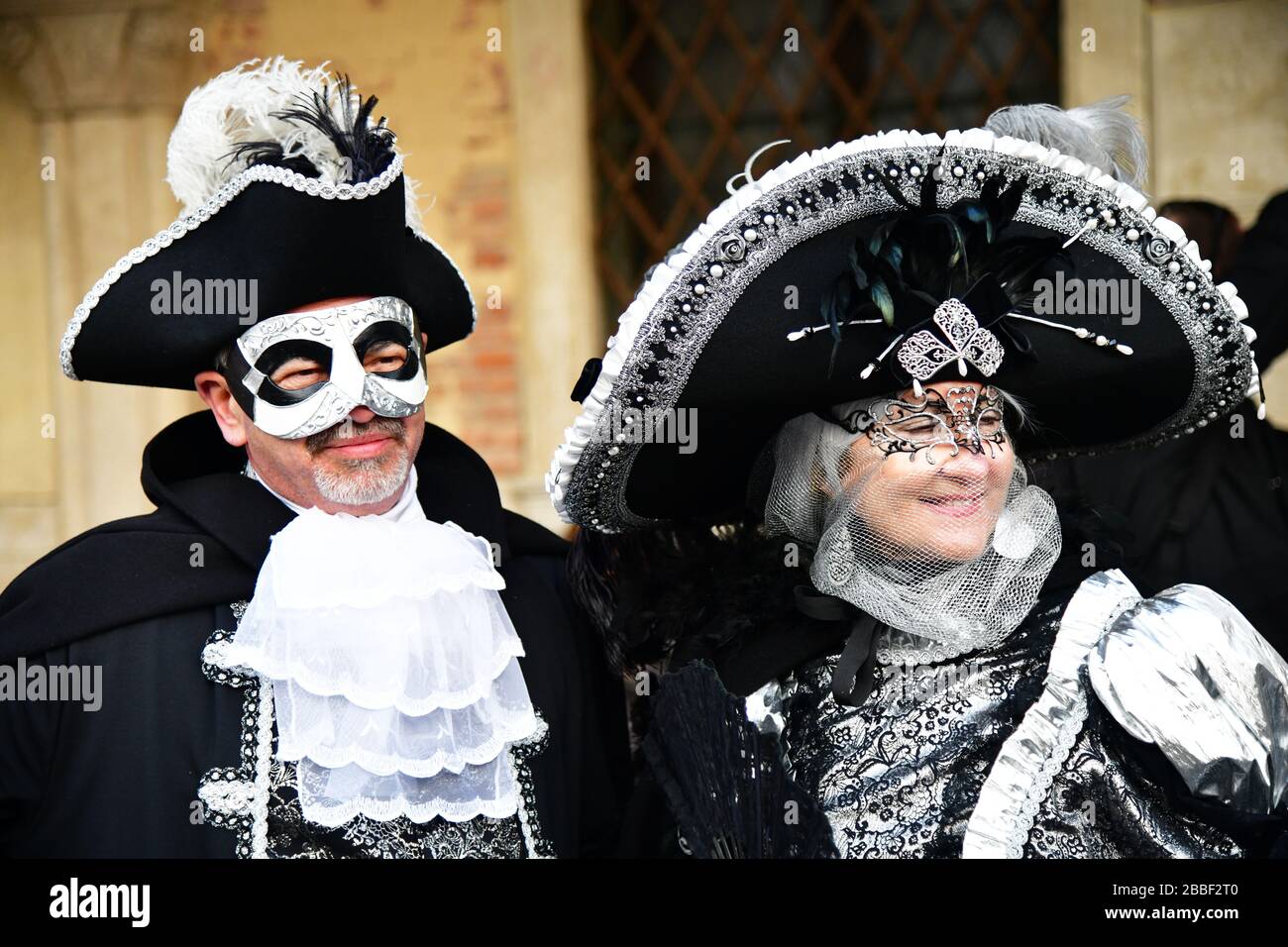 Venice, Italy-February 2020; close up a man and woman in traditional masquerade  ball costumes for coming carnival in Venice Stock Photo - Alamy