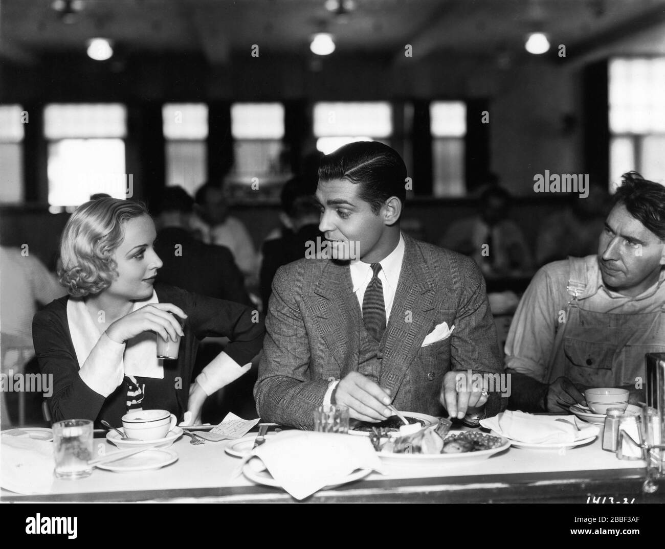 CLARK GABLE and CAROLE LOMBARD studio candid at Paramount's Lunch Counter during filming of NO MAN OF HER OWN 1932 director WESLEY RUGGLES Paramount Pictures Stock Photo