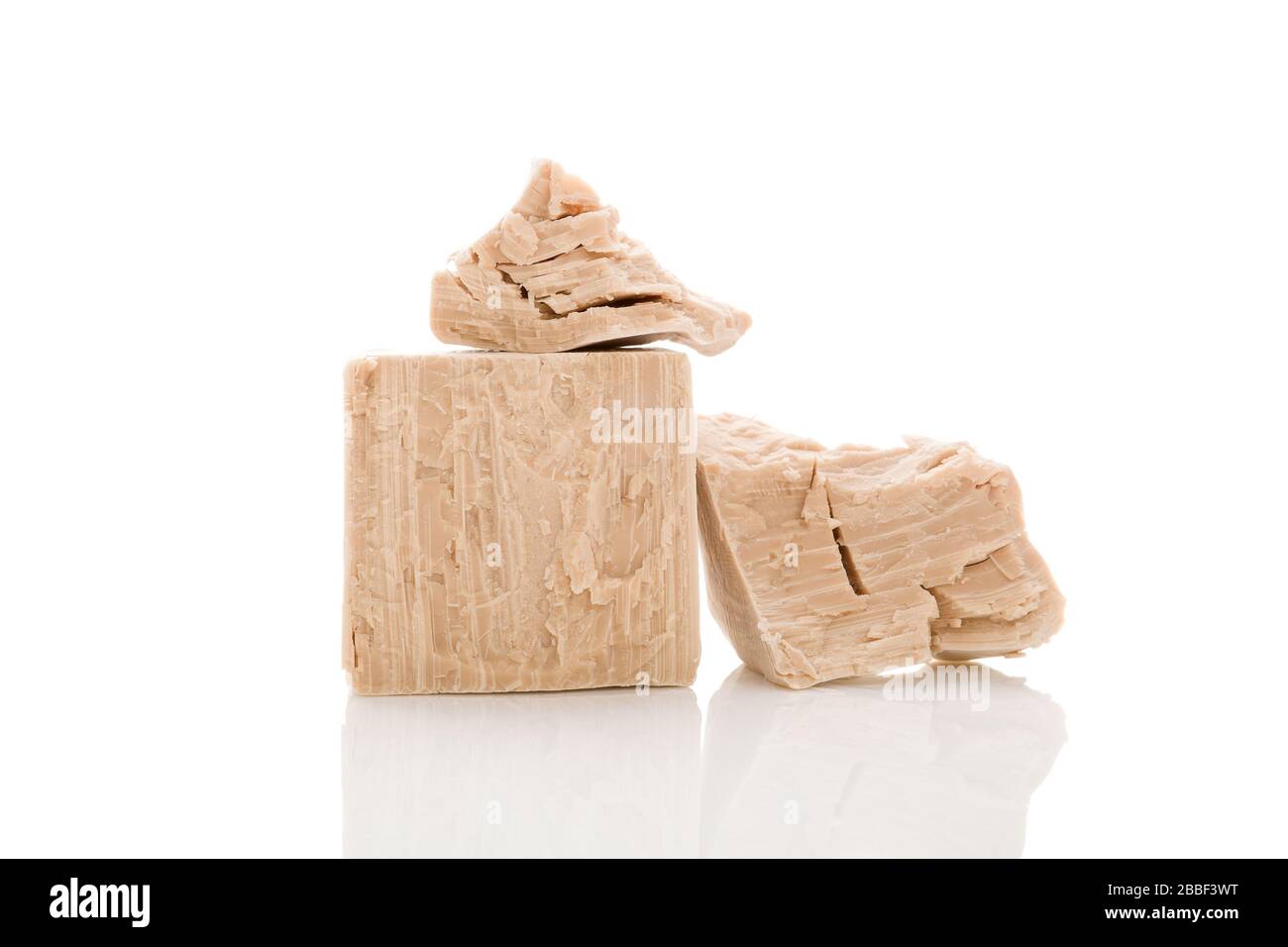 Yeast blocks isolated on white background. Stock Photo