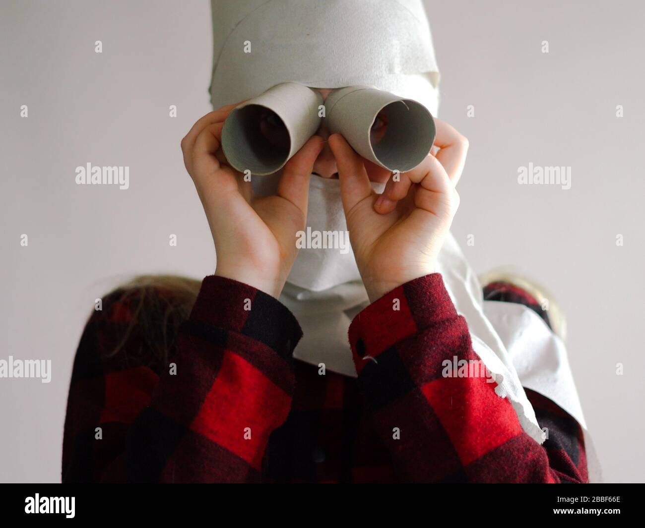 Funny Photo Quarantined Due To An Epidemic Of Coronavirus Girl In A Mask From Toilet Paper Posing On A Gray Background Stock Photo Alamy