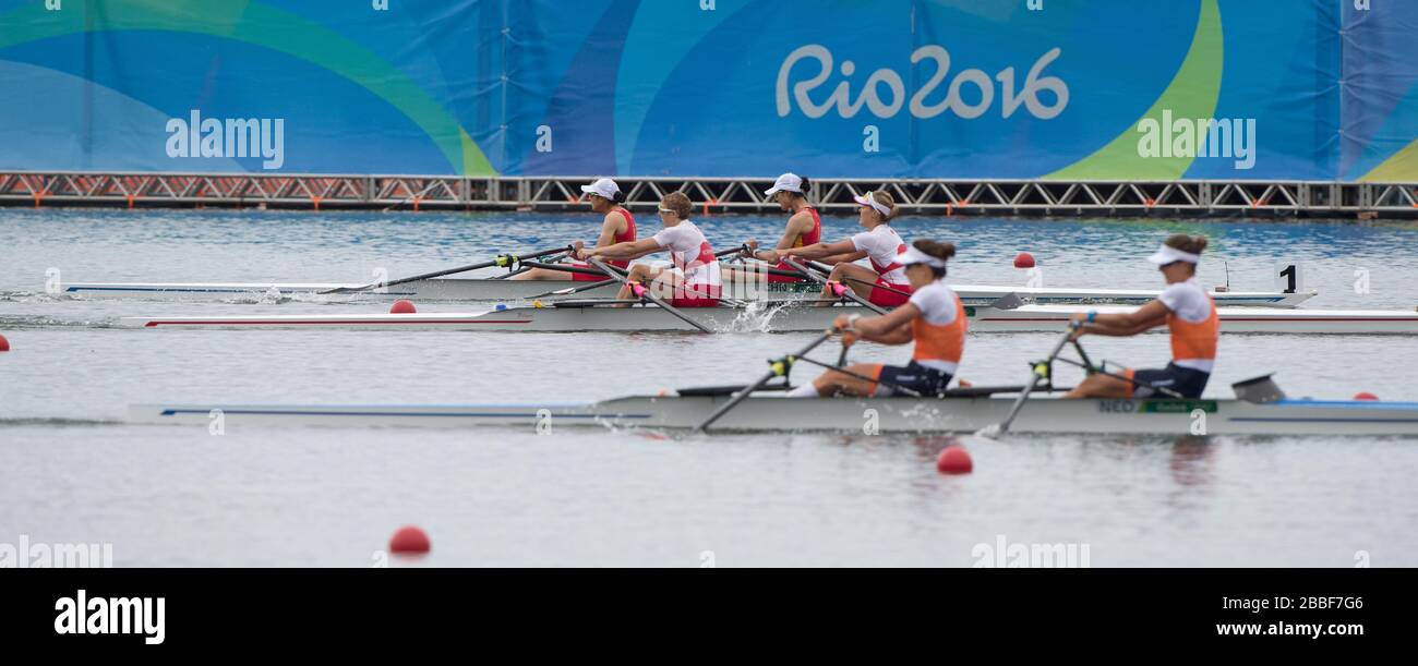 Rio de Janeiro. BRAZIL. Gold Medalist NED LW2X. Bow. Ilse PAULIS, and Maaike HEAD, after winning the final, supporters swim out to greet and congratulate the double. 2016  2016 Olympic Rowing Regatta. Lagoa Stadium, Copacabana,  “Olympic Summer Games” Rodrigo de Freitas Lagoon, Lagoa. Local Time 10:39:01  Friday  12/08/2016  [Mandatory Credit; Peter SPURRIER/Intersport Images] Stock Photo