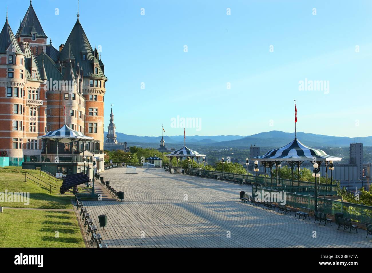 Chateau Frontenac and Dufferin Terrace in early morning sunlight, Quebec City, Province of Quebec, Canada Stock Photo