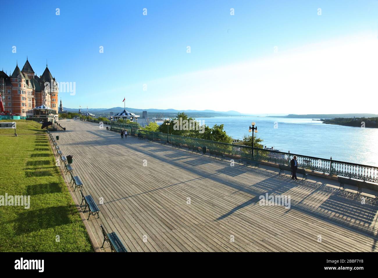 Chateau Frontenac, Dufferin Terrace and the St. Lawrence River in early morning sunlight, Quebec City, Province of Quebec, Canada Stock Photo