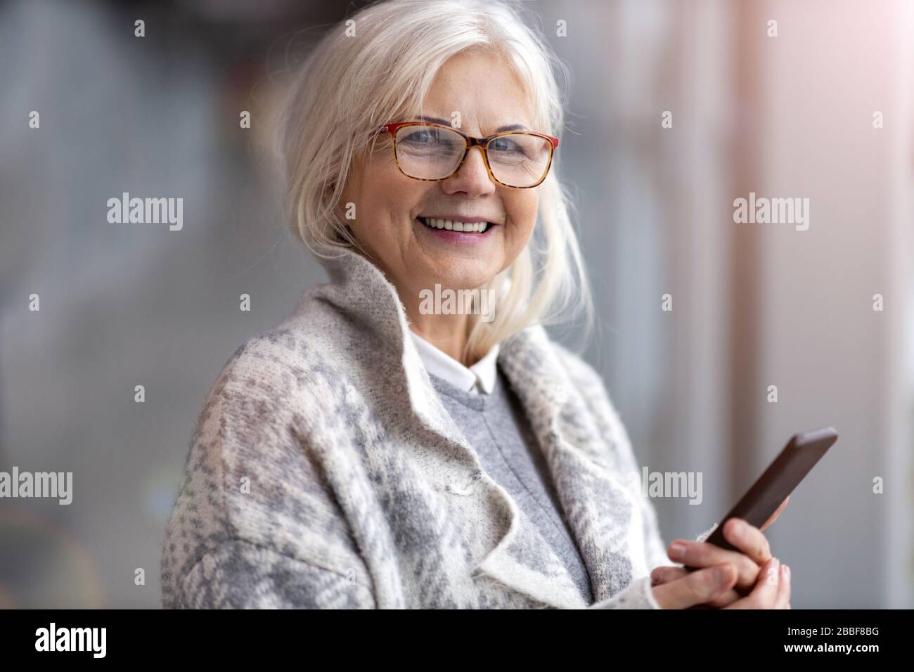 Portrait of senior woman smiling Stock Photo