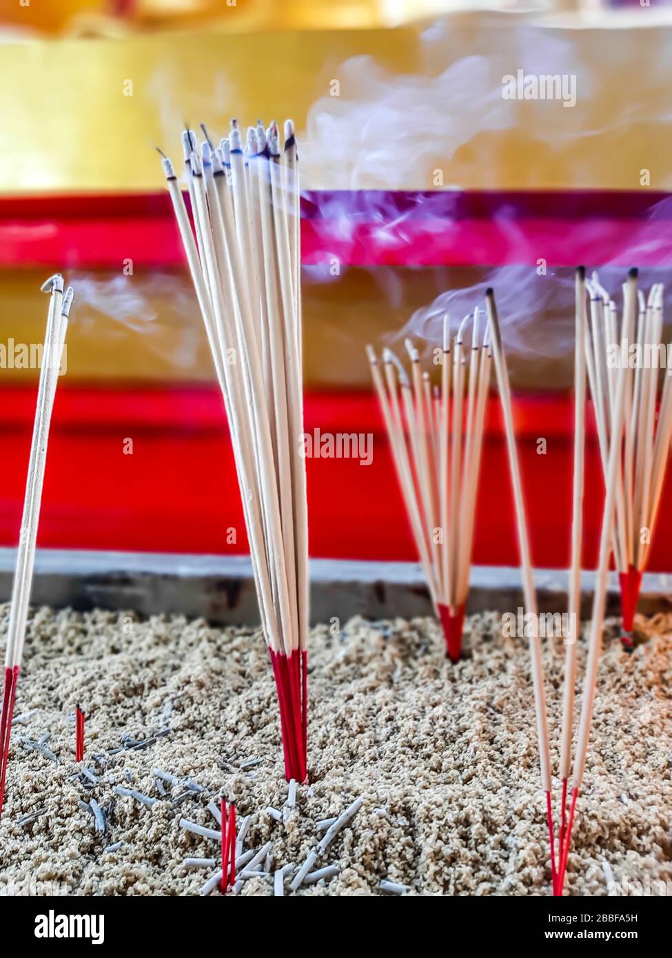Close up burning incense sticks and smoke from incense burning.Incense