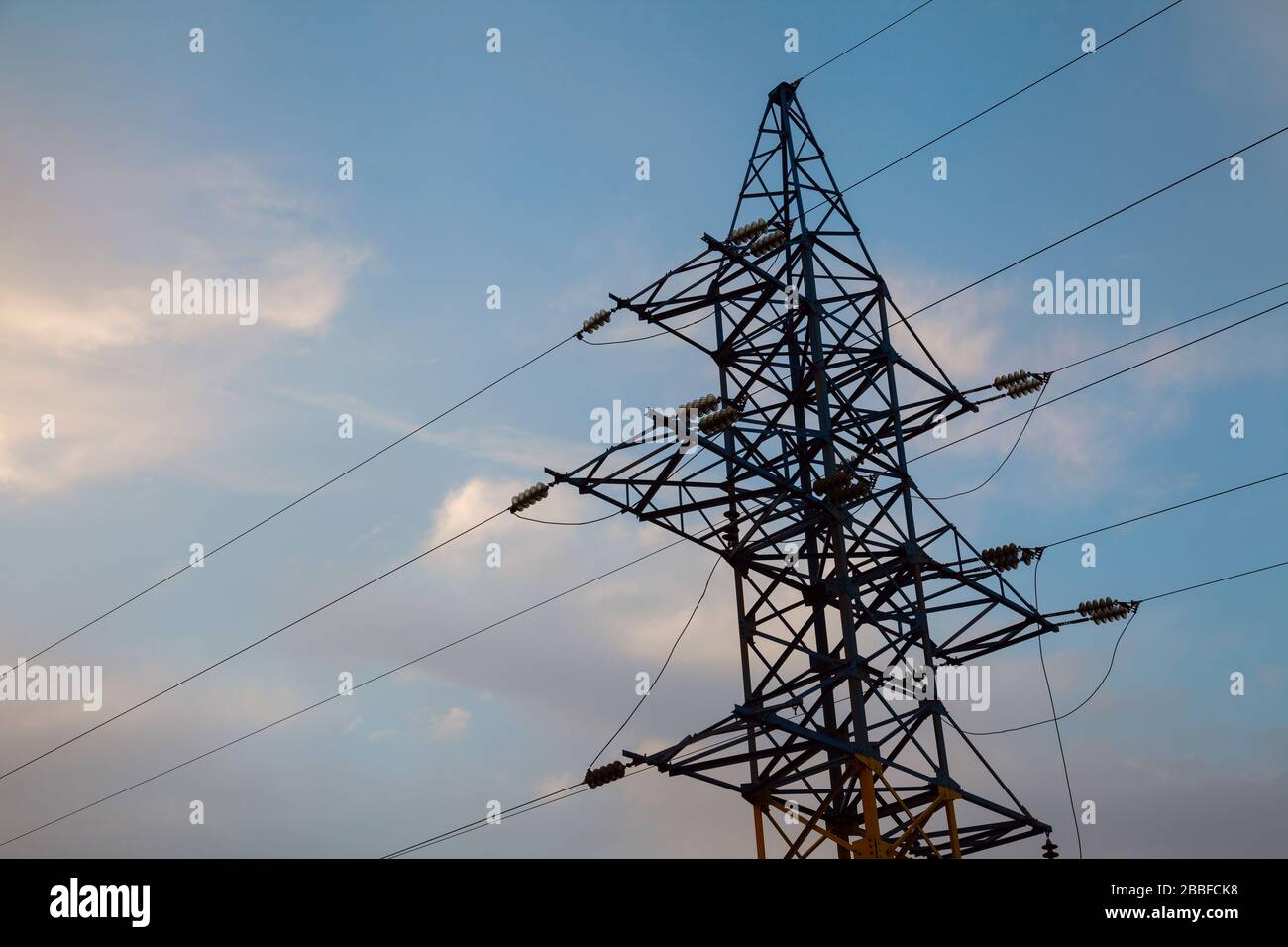High-voltage networks, against the evening sky Stock Photo