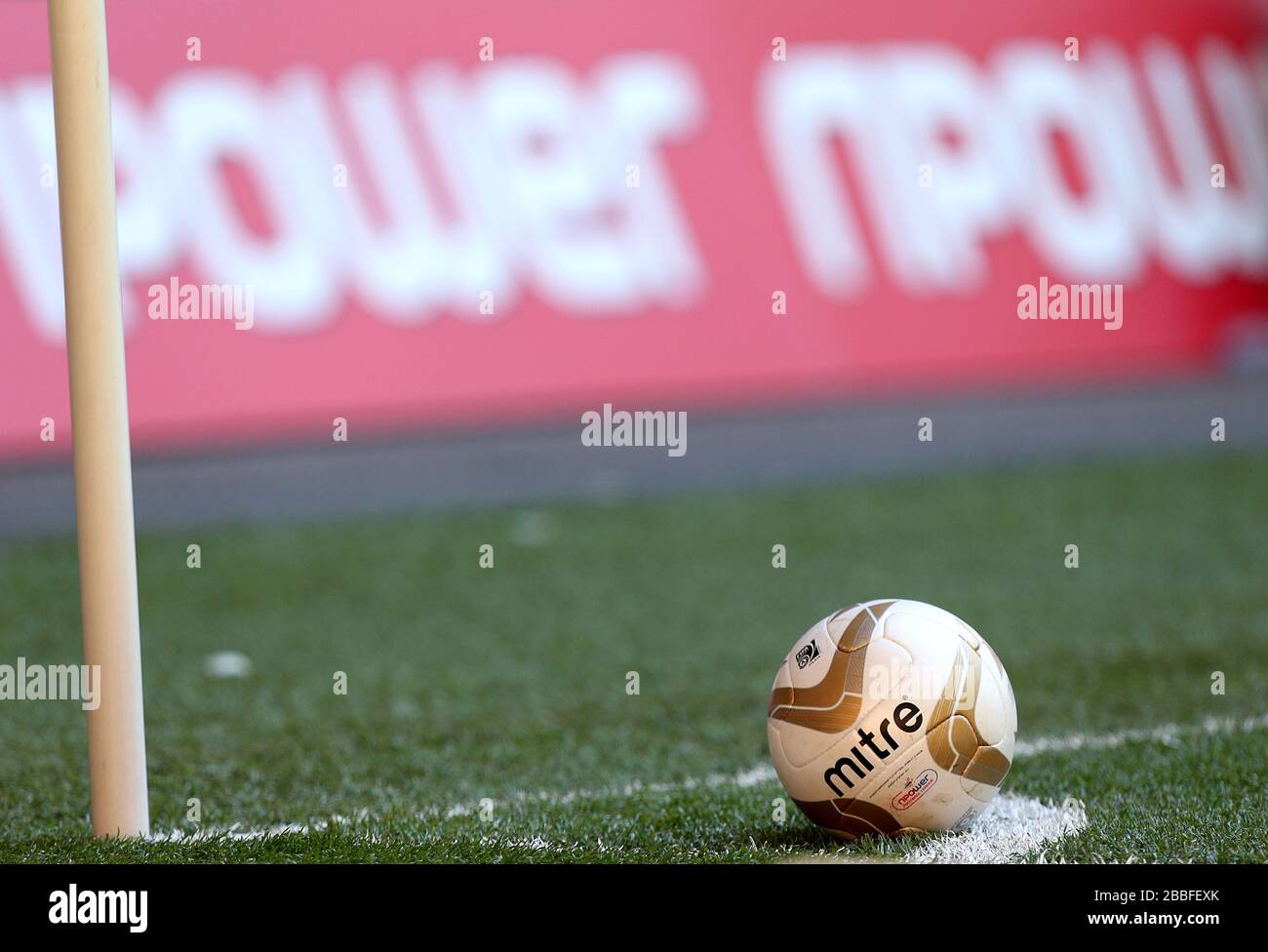 A Mitre branded match day ball at the corner flag Stock Photo Alamy