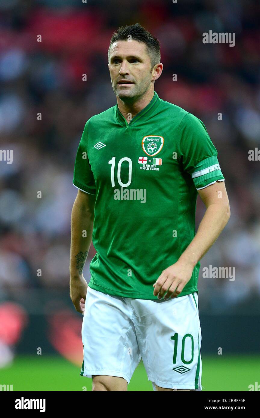Robbie keane celebration hi-res stock photography and images - Alamy