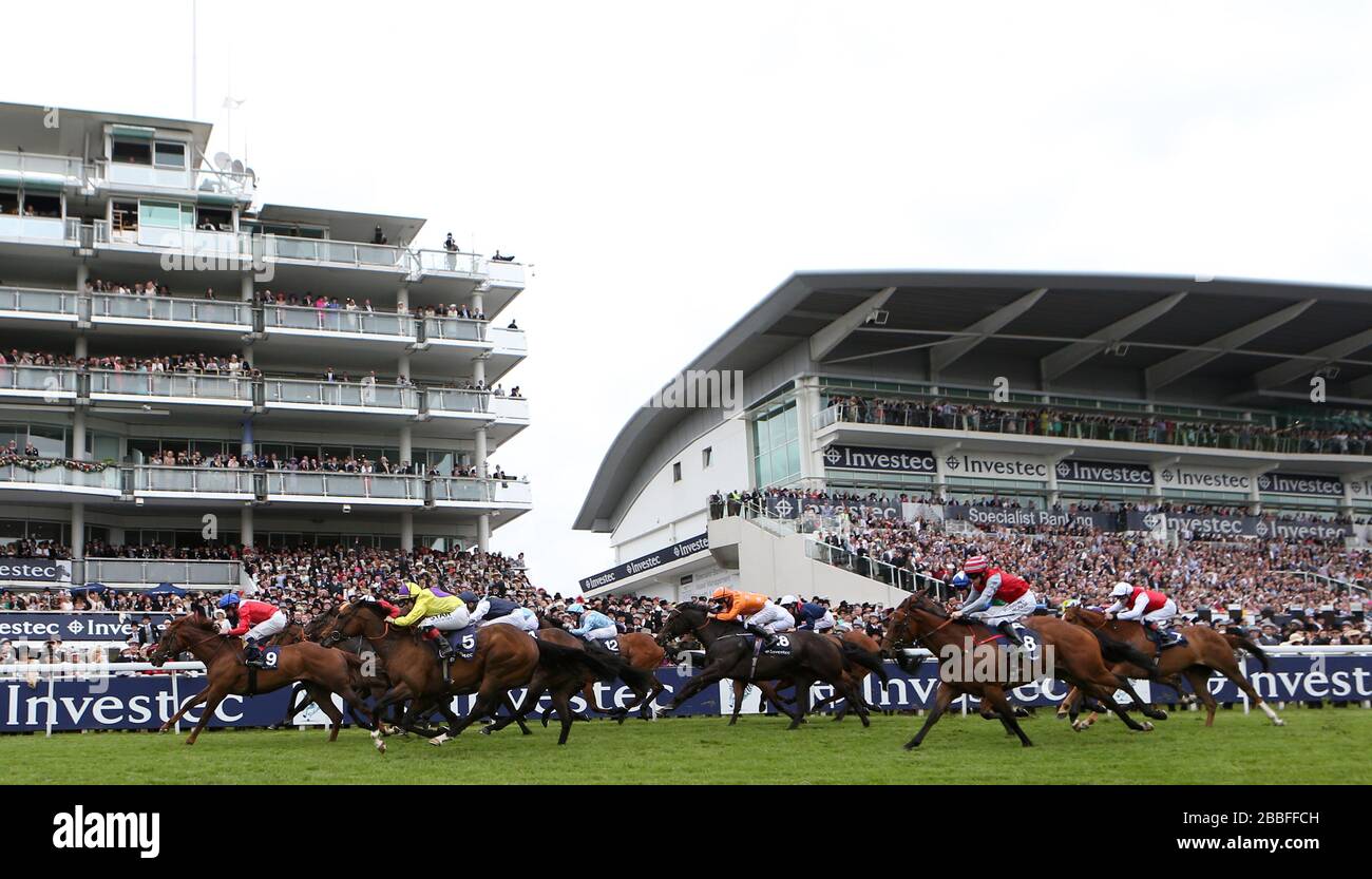 Duke of Firenze (no 9) ridden by Ryan Moore comes home to win The Investec Specialist Bank 'Dash' Stock Photo
