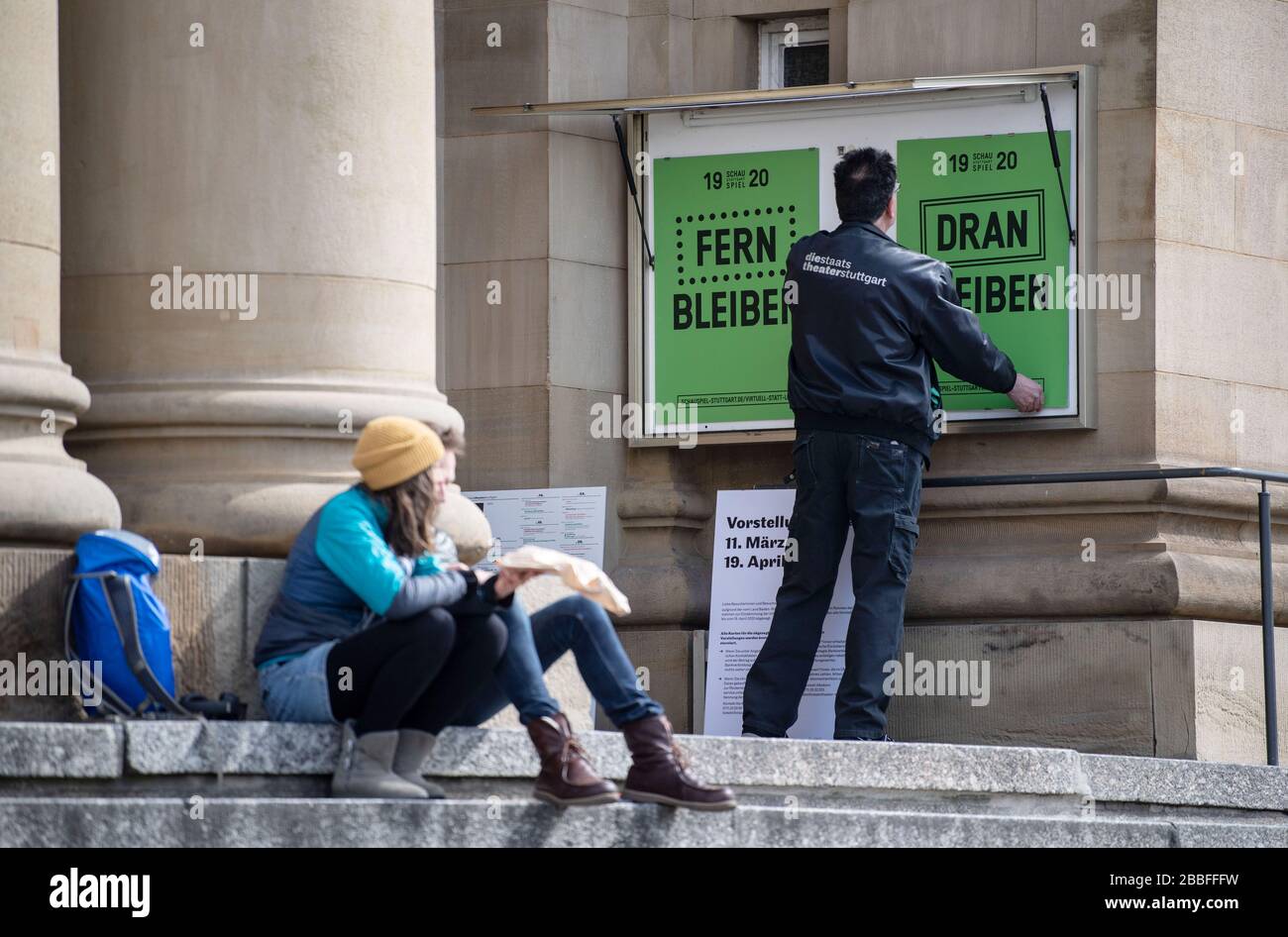 Stuttgart Germany 31st Mar 2020 An Employee Of The Staatstheater Stuttgart Hangs Posters With The Words
