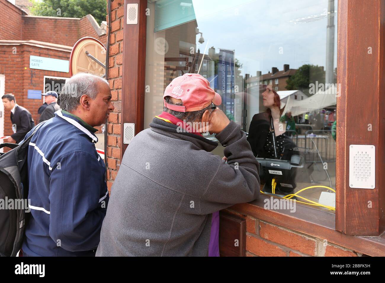Fans queue at the Membership and Ticketing Enquiries office at the Kia ...