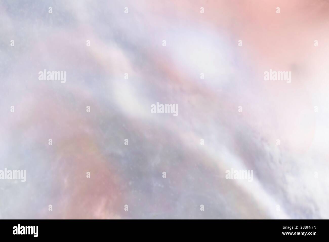 Abstract cloudy blur texture pearl background with shimmering hues of mauve, peach and ocean blue colors Stock Photo
