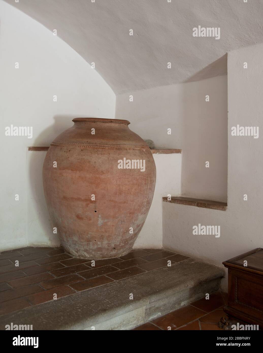interior of Italian Villa with huge Amphora, Tuscany Italy Stock Photo